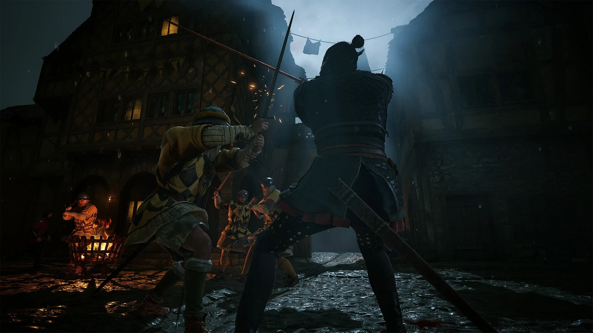 An armed fighter confronts a vampire in a torchlit village street